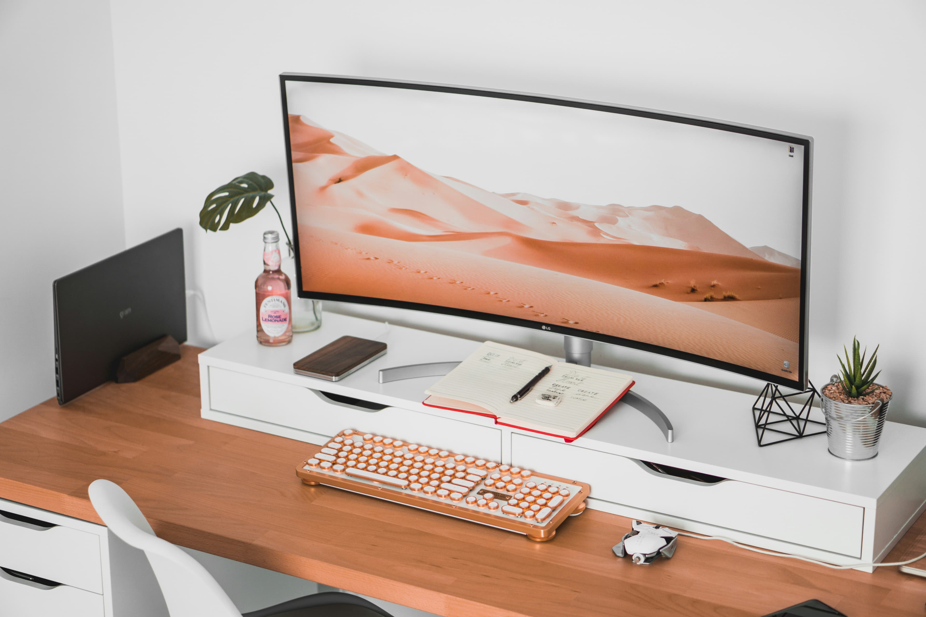 The Dell Alienware AW3418DW is a 34-inch curved gaming monitor with a 3440 x 1440 resolution, 120Hz refresh rate, and a 4ms response time. It has excellent color accuracy and is compatible with both NVIDIA G-Sync and AMD FreeSync technologies.