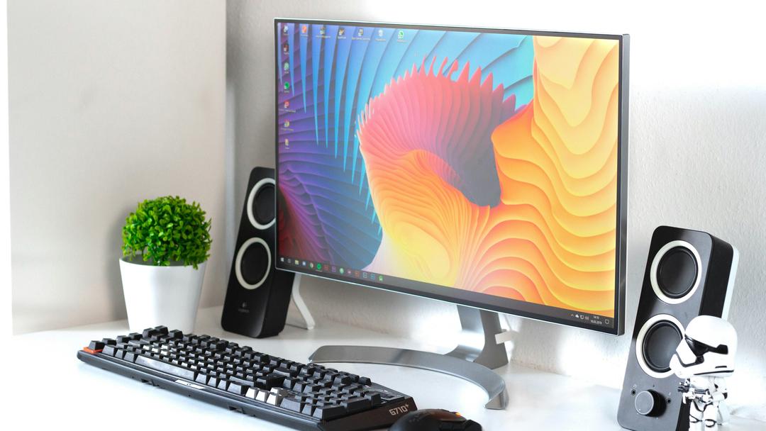 The Samsung LC49RG90SSNXZA is a 49-inch curved gaming monitor with a 5120 x 1440 resolution, 120Hz refresh rate, and a 4ms response time. It has excellent color accuracy and is compatible with AMD FreeSync 2 technology.