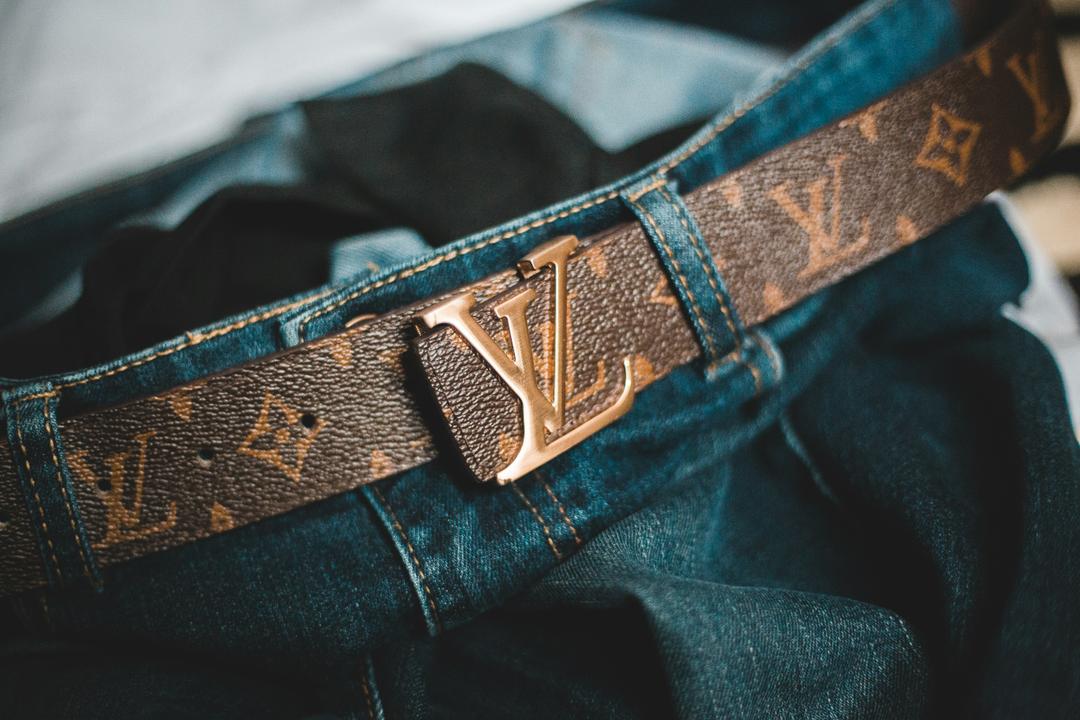 The Levi's Men's Reversible Belt is made from high-quality leather and features a silver-tone buckle. It is reversible, so you can switch between black and brown depending on your outfit. The belt is also adjustable and can be cut to fit your waist size.