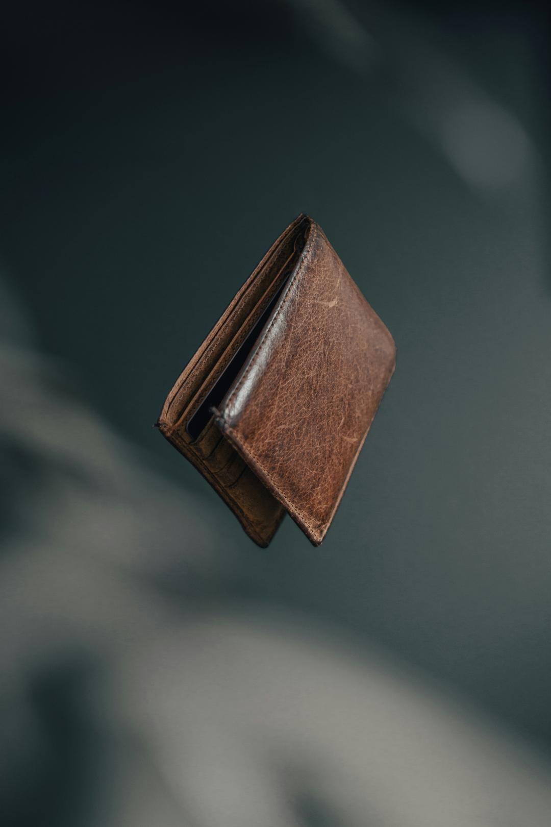 The Tommy Hilfiger Men's Leather Wallet is made from high-quality leather and features multiple card slots and a bill compartment. It has a classic design that is both stylish and functional, making it the perfect accessory for any occasion.
